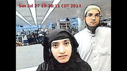 Tashfeen Malik and Syed Rizwan Farook were photographed at Chicago's O'Hare International Airport in 2014.