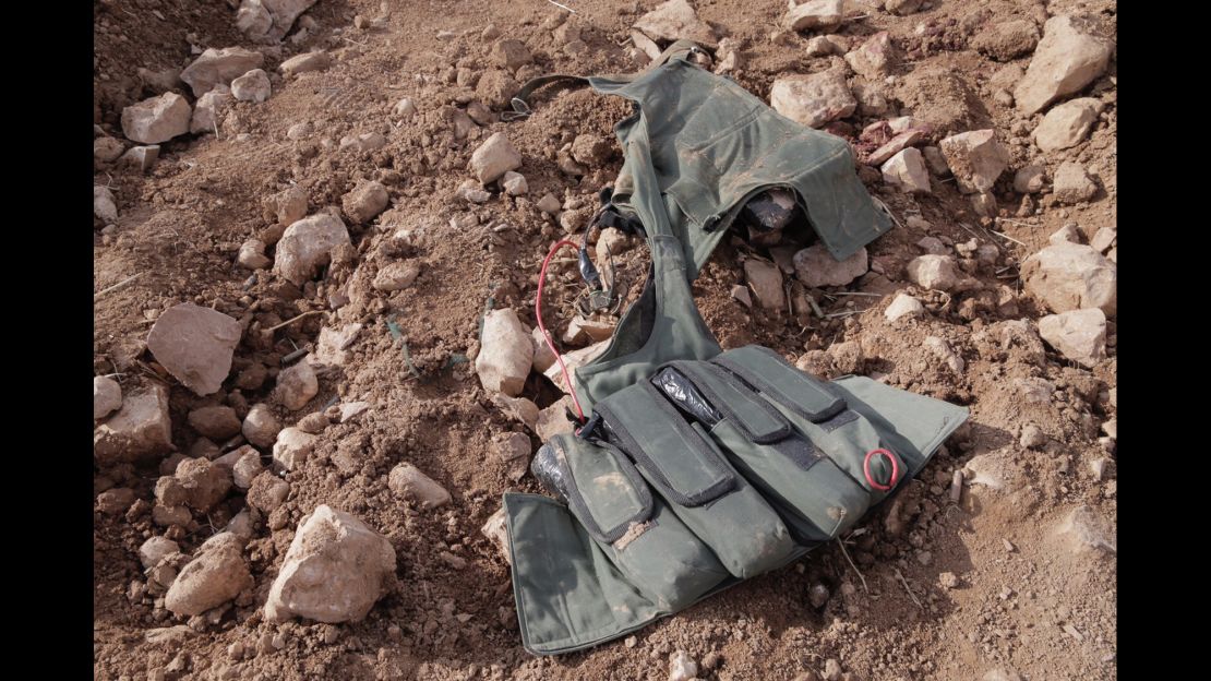 A suicide vest is found on one of the ISIS fighters.