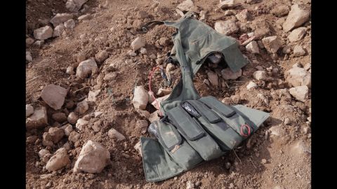 A suicide vest is found on one of the ISIS fighters.