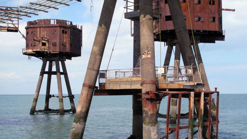 The 760-ton towers were originally built on land and then towed out to sea on barges where they were sunk on concrete bases in the shallow waters of the Thames Estuary.