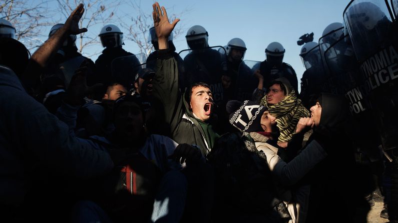 Greek anti-riot police clash with migrants at the border.