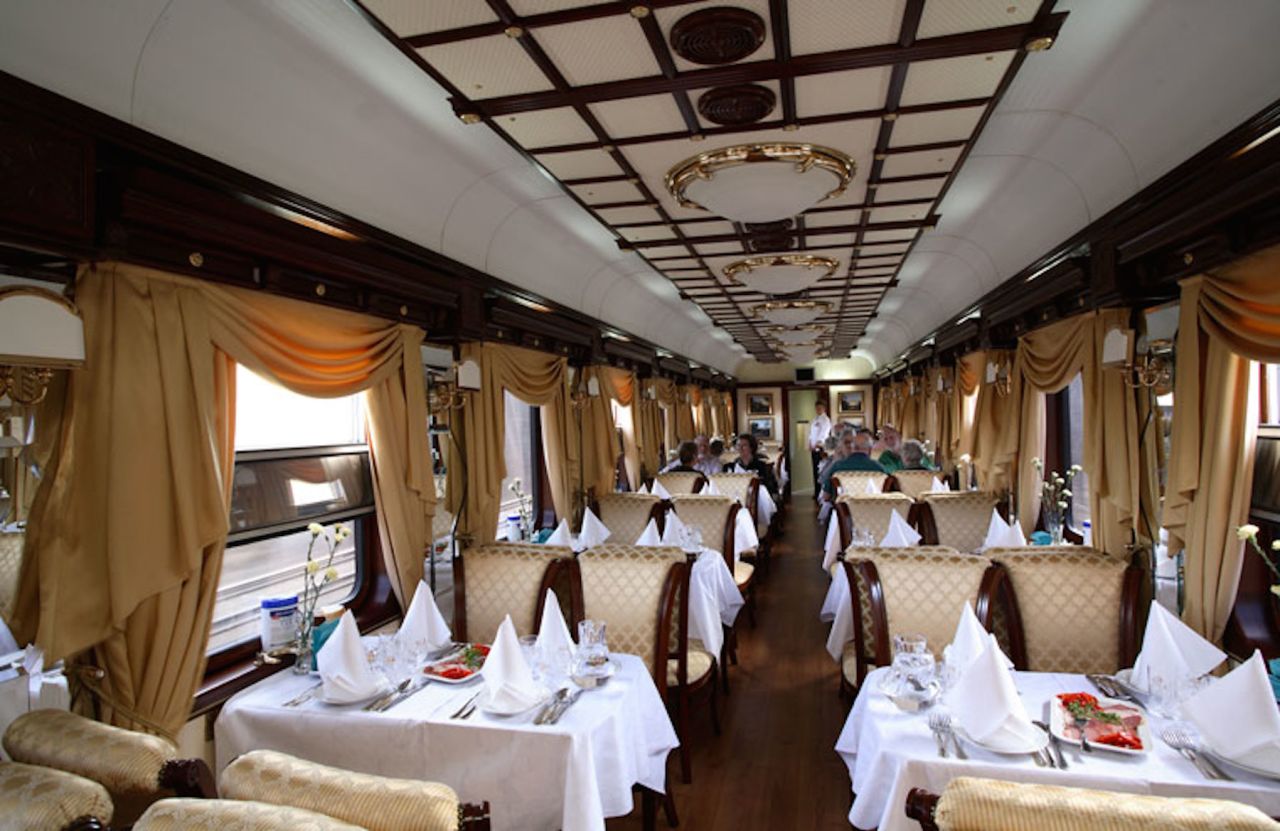 The Golden Eagle features both a restaurant car and a separate lounge. The restaurant car, pictured, serves a breakfast buffet, while lunch and dinner menus feature local specialties such as black sturgeon and red pacific salmon caviar. 