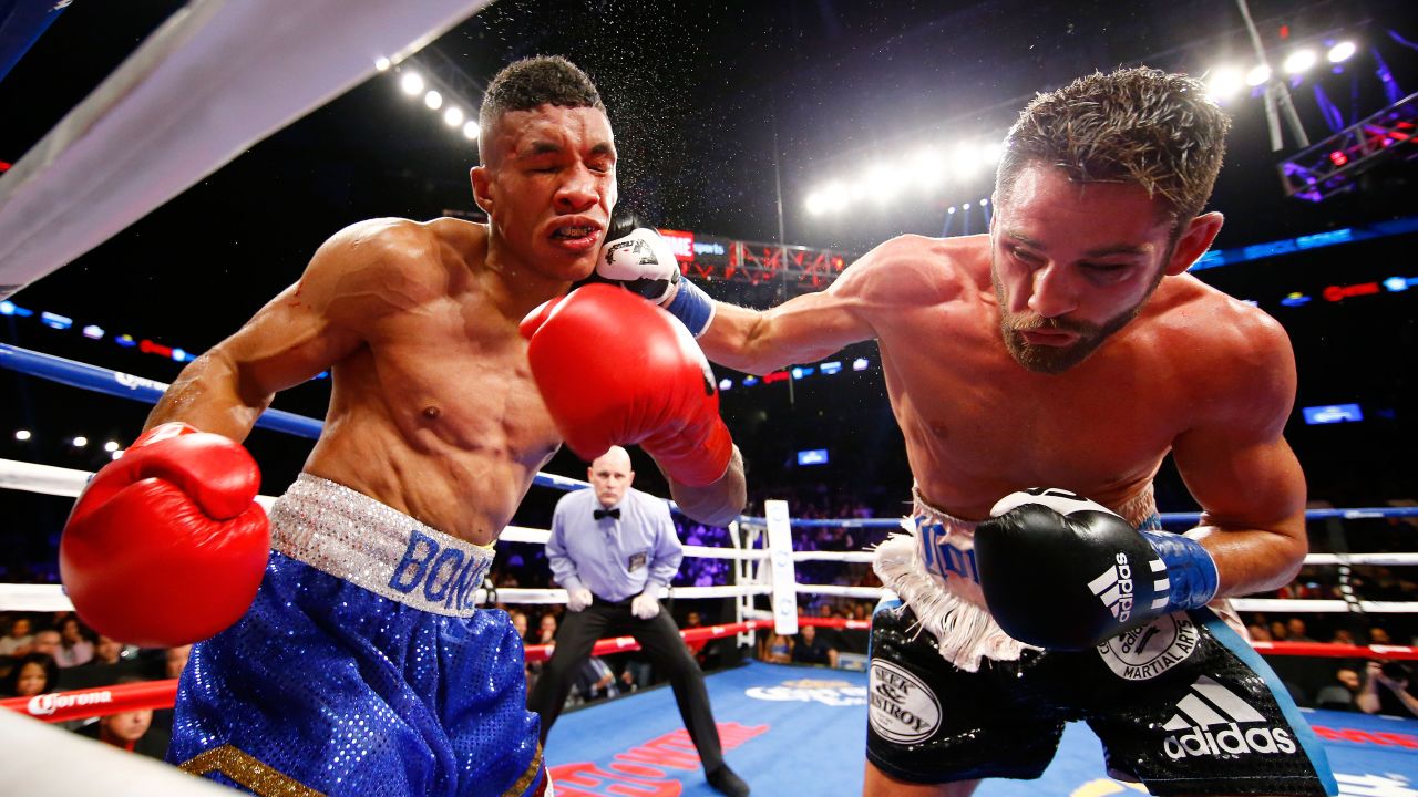 Chris Algieri lands a right hand against Erick Bone during their welterweight bout in New York on Saturday, December 5. Algieri won by unanimous decision.