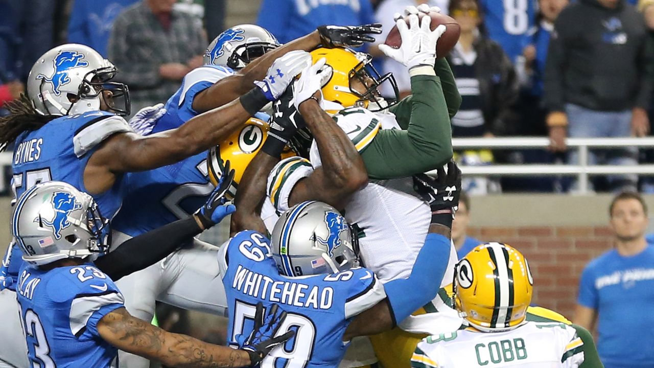 Richard Rodgers hauls in a 61-yard "Hail Mary" touchdown to give the Green Bay Packers a last-second victory at Detroit on Thursday, December 3. 
