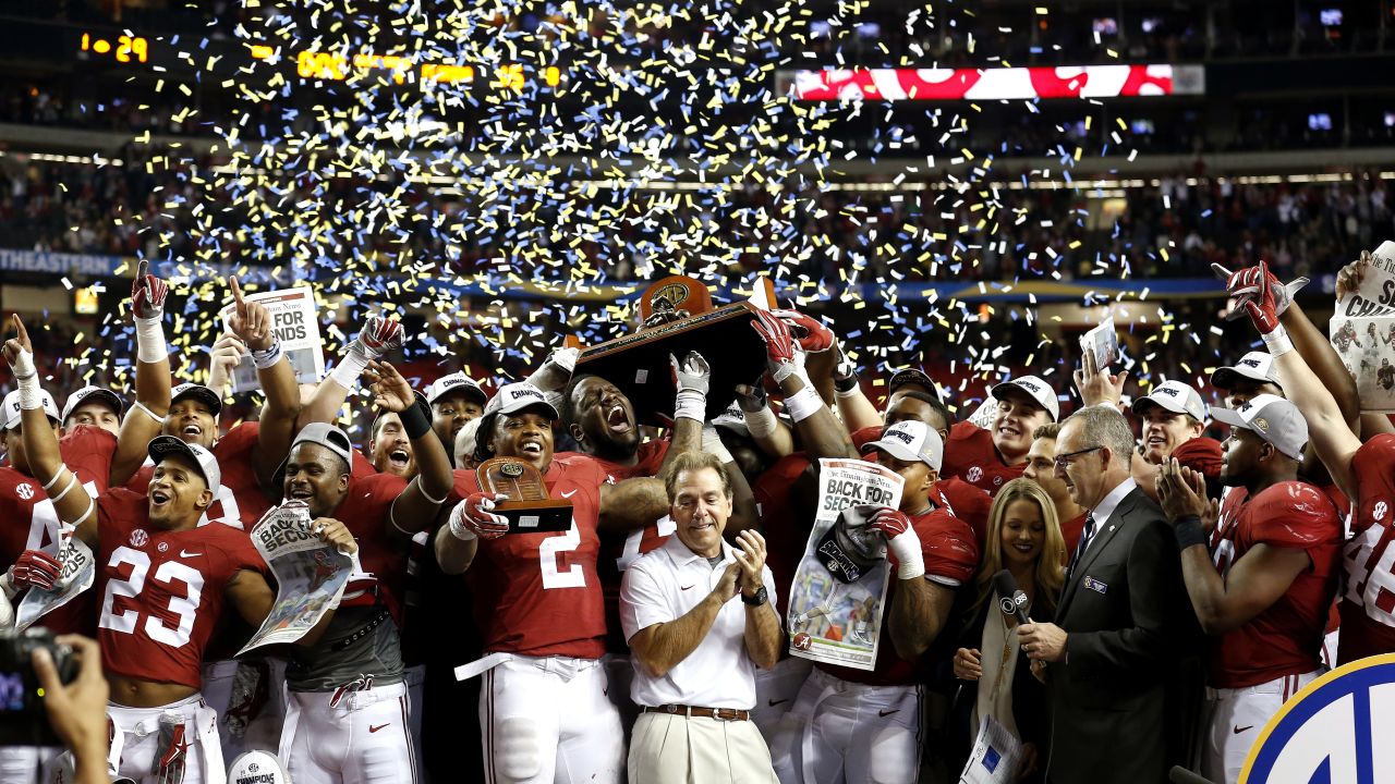 Alabama's football team celebrates its 29-15 victory over Florida in the SEC Championship game on Saturday, December 5. Alabama will join Clemson, Michigan State and Oklahoma in the College Football Playoff.