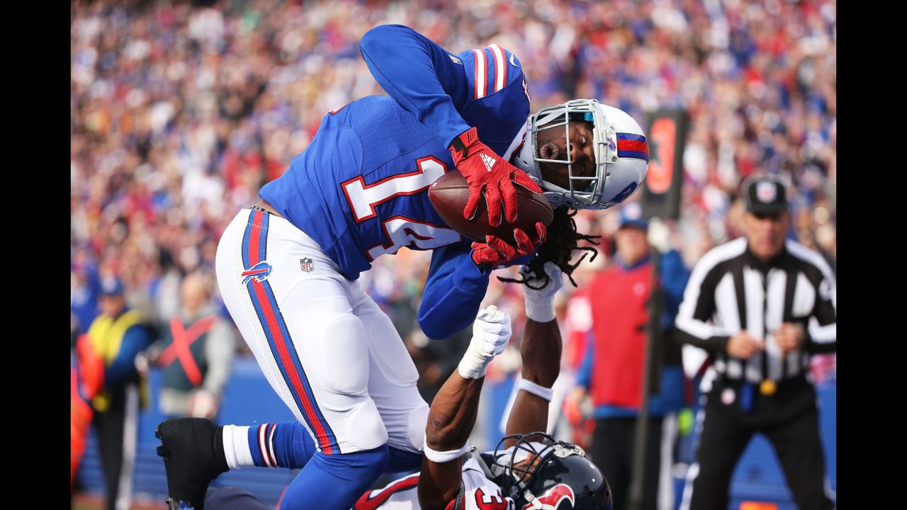 Buffalo wide receiver Sammy Watkins scores a touchdown as he's defended by Houston's Kevin Johnson during an NFL game in Orchard Park, New York, on Sunday, December 6. Watkins had three catches for 109 yards as Buffalo won 30-21.