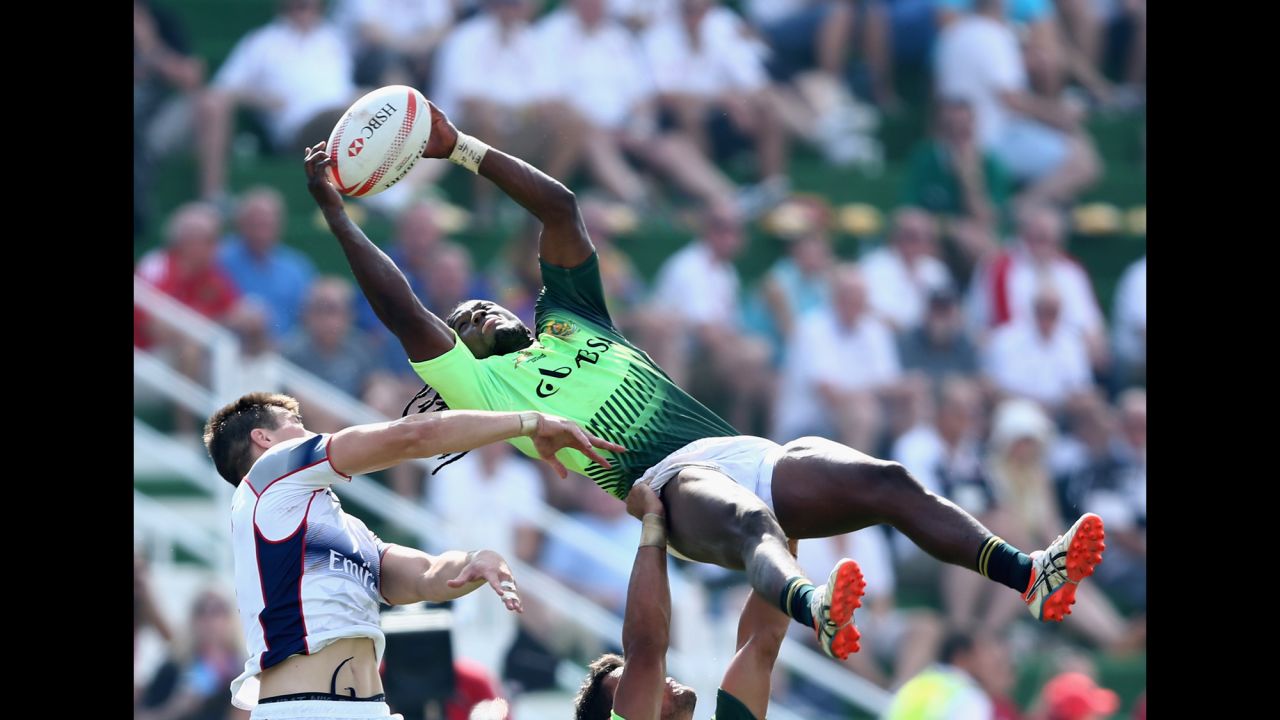 South Africa's Seabelo Senatla reaches for the ball during a rugby sevens match against the United States on Saturday, December 5. It was the quarterfinals of the Dubai Sevens in Dubai, United Arab Emirates. The United States won 21-19. 
