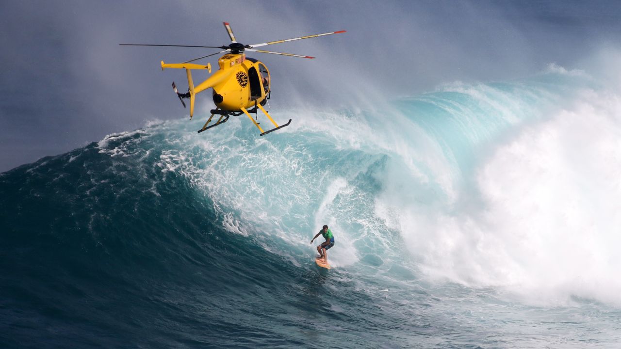 Professional surfer Albee Layer drops into a wave in Wailea, Hawaii, on Sunday, December 6.