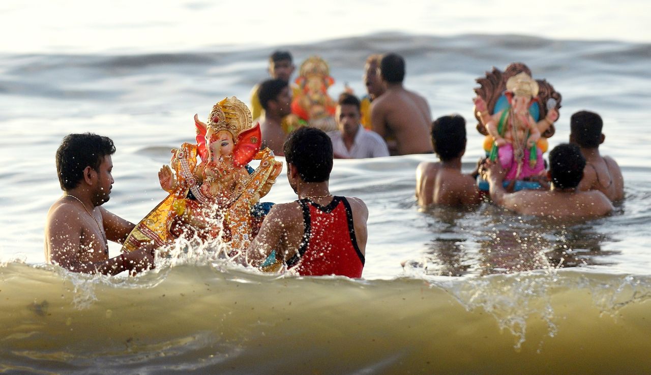Chowpatty, a stretch of sand in Mumbai, hosts the annual festival of Ganesh. Indian Hindu devotees carry idols of elephant-headed Hindu god Ganesha and immerse them in the sea at the end of the 10-day festival as a part of a cleansing ritual. 