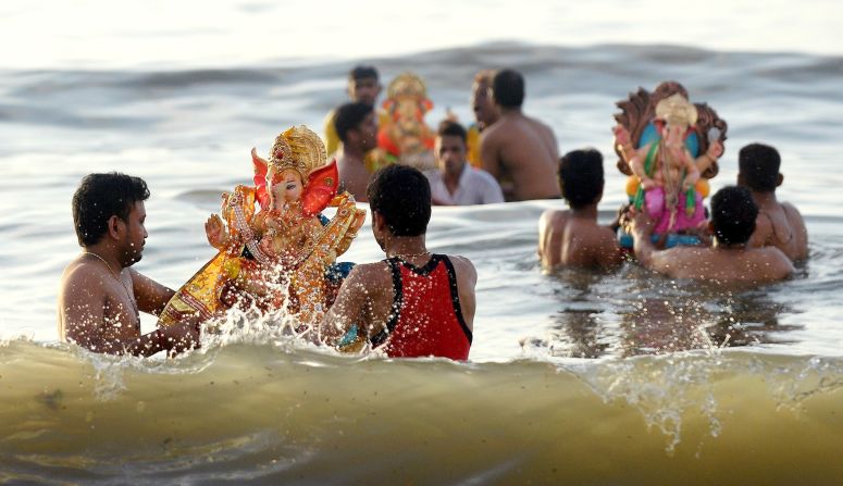 Chowpatty, a stretch of sand in Mumbai, hosts the annual festival of Ganesh. Indian Hindu devotees carry idols of elephant-headed Hindu god Ganesha and immerse them in the sea at the end of the 10-day festival as a part of a cleansing ritual. 