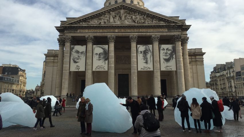 An artist brought tons of ice from Greenland to Paris to raise awareness about climate change.