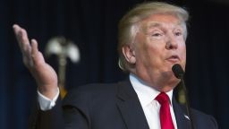 In this Dec. 2, 2015, photo, Republican presidential candidate Donald Trump speaks during a campaign rally at the Prince William County Fair Ground in Manassas, Va. Trump tapped a man to be a senior business adviser to his real-estate empire even after the mans past involvement in a major mafia-linked stock fraud scheme became public. Felix Sater pleaded guilty to one count of racketeering in 1998. His conviction remained secret for nearly a decade as he worked as a government informant and an executive at the Bayrock Group, a real estate firm that partnered with Trump.  (AP Photo/Cliff Owen)