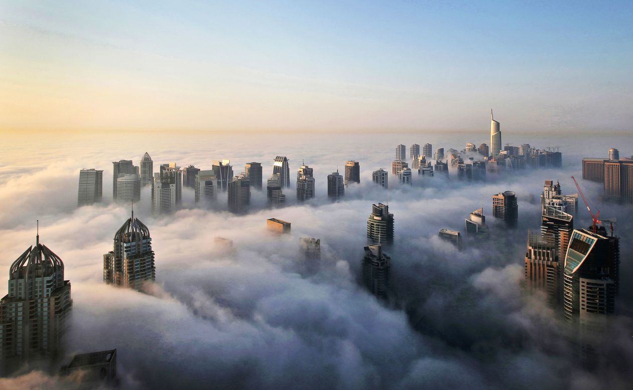 Where just 15 years ago there was empty, flat land, this stretch of Dubai is now home to the bustling Marina and Jumeirah Lake Towers districts. The impressive skyline is seen here piercing through a blanket of early morning fog. 