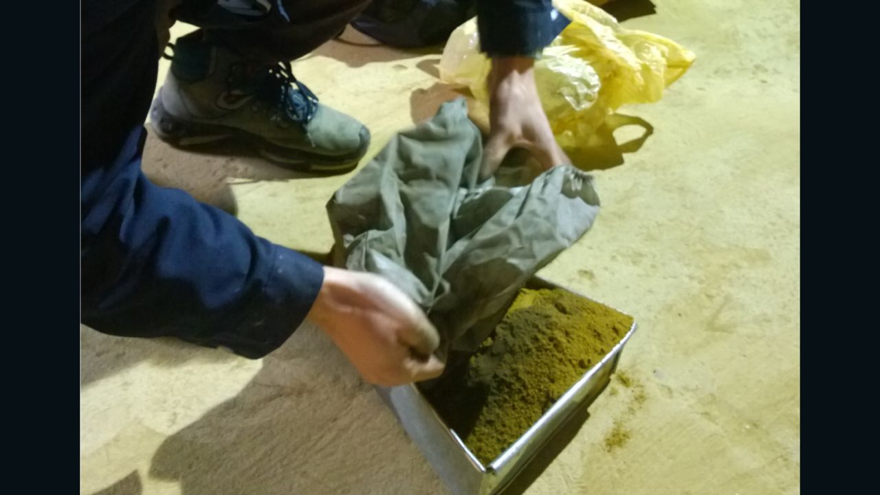 The pollutants sucked out of the air by Brother Nut shortly before they are turned into a brick.