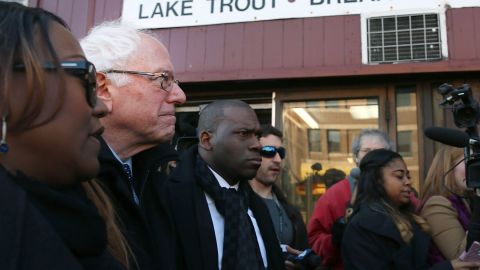 BALTIMORE, MD - DECEMBER 08: Democratic presidential candidate Sen. Bernie Sanders, (I-VT) is given a tour of Sandtown-Winchester Neighborhood where Freddie Gray lived and was arrested, December 8, 2015 in Baltimore, Maryland. Sen. Sanders later met with African-American religious and civic leaders. (Photo by Mark Wilson/Getty Images)