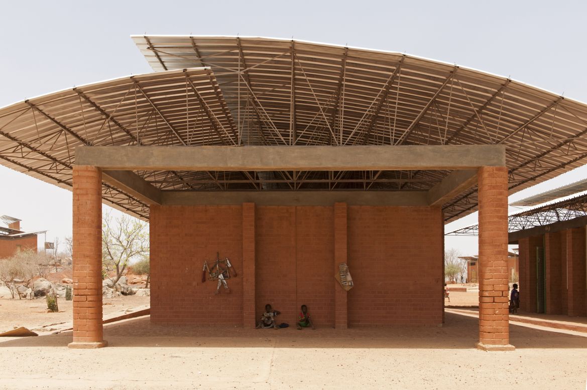 Burkina Faso-born architect Francis Kere originally designed the Opera Village as an arts center. However, a devastating flood in the country changed its remit. The building serves primarily as a school, educating up to 300 students, though with a focus on art. 