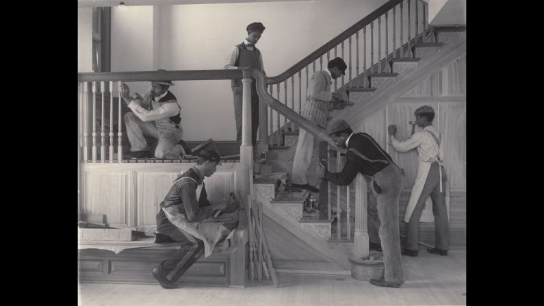 Students work on the stairway of the treasurer's residence at the Hampton Institute, a school that provided vocational training and education for newly freed slaves and Native Americans, <a href="index.php?page=&url=http%3A%2F%2Fwww.moma.org%2Flearn%2Fmoma_learning%2Ffrances-benjamin-johnston-the-hampton-album-1899-1900" target="_blank" target="_blank">according to the Museum of Modern Art. </a>The picture was taken at the turn of the 20th century by American photographer Frances Benjamin Johnston (1864-1952).