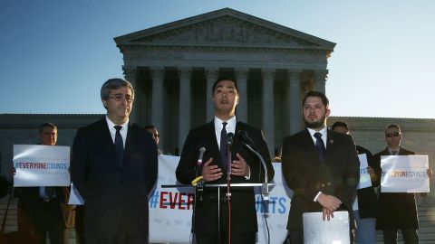 U.S. Rep. Joaquin Castro (D-TX) (C) speaks as Rep. Ruben Gallego (D-AZ) (R) and Mexican American Legal Defense and Education Fund President and General Counsel Thomas Saenz (L) listen during a news conference in front of the Supreme Court December 8, 2015 in Washington, DC. 