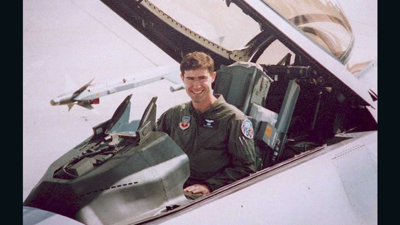 In a 1995 photo, the pilot sits in an F-16 similar to the one he was flying over Bosnia.