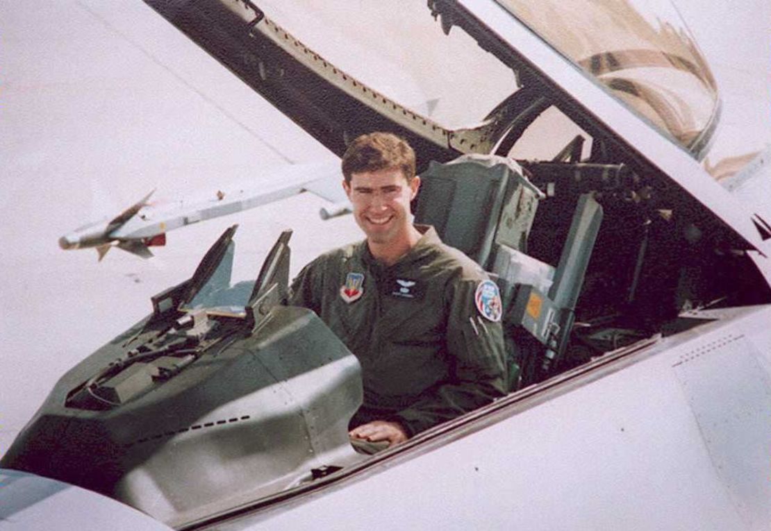 In a 1995 photo, the pilot sits in an F-16 similar to the one he was flying over Bosnia.
