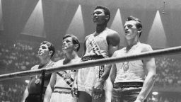 The winners of the 1960 Olympic medals for light heavyweight boxing on the winners' podium at Rome: Cassius Clay (now Muhammad Ali) (C), gold; Zbigniew Pietrzykowski of Poland (R), silver; and Giulio Saraudi (Italy) and Anthony Madigan (Australia), joint bronze.   (Photo by Central Press/Getty Images)