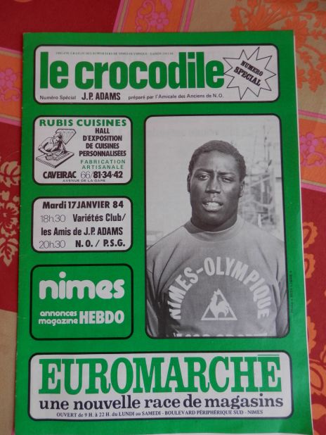 A program showing a match organized by Adams' former club Nîmes in aid of the footballer in 1984, two years after his accident. 