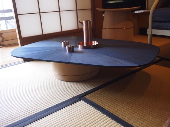 This indigo-dyed table was also designed and built in collaboration with OeO. 
