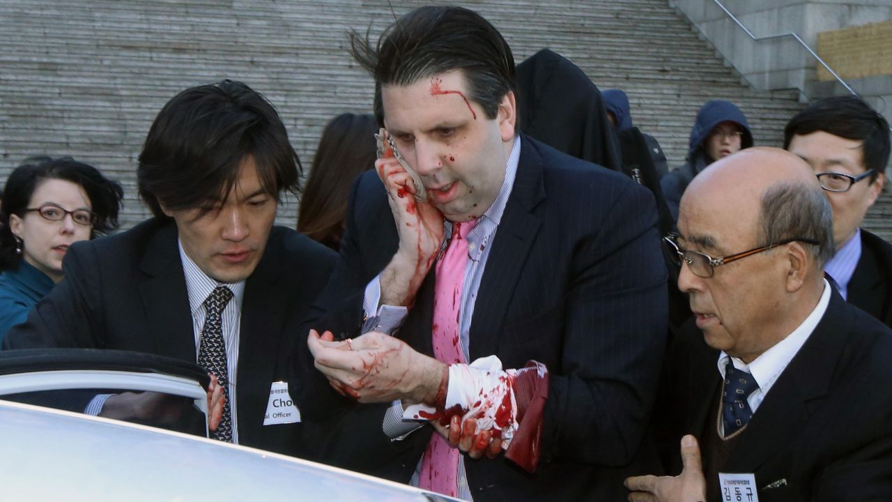 Mark Lippert, the U.S. ambassador to South Korea, leaves for a hospital after he was attacked Thursday, March 5, in Seoul, South Korea. According to Seoul police, Lippert <a href="http://www.cnn.com/2015/03/04/politics/ambassador-attacked-south-korea/index.html" target="_blank">was slashed on his right cheek and hand</a> with a knife measuring about 10 inches long. The attacker, Kim Ki-Jong, <a href="http://www.cnn.com/2015/09/10/asia/south-korean-stabbing-sentence-u-s-ambassador/" target="_blank">was convicted of attempted murder in September</a> and sentenced to 12 years in prison.