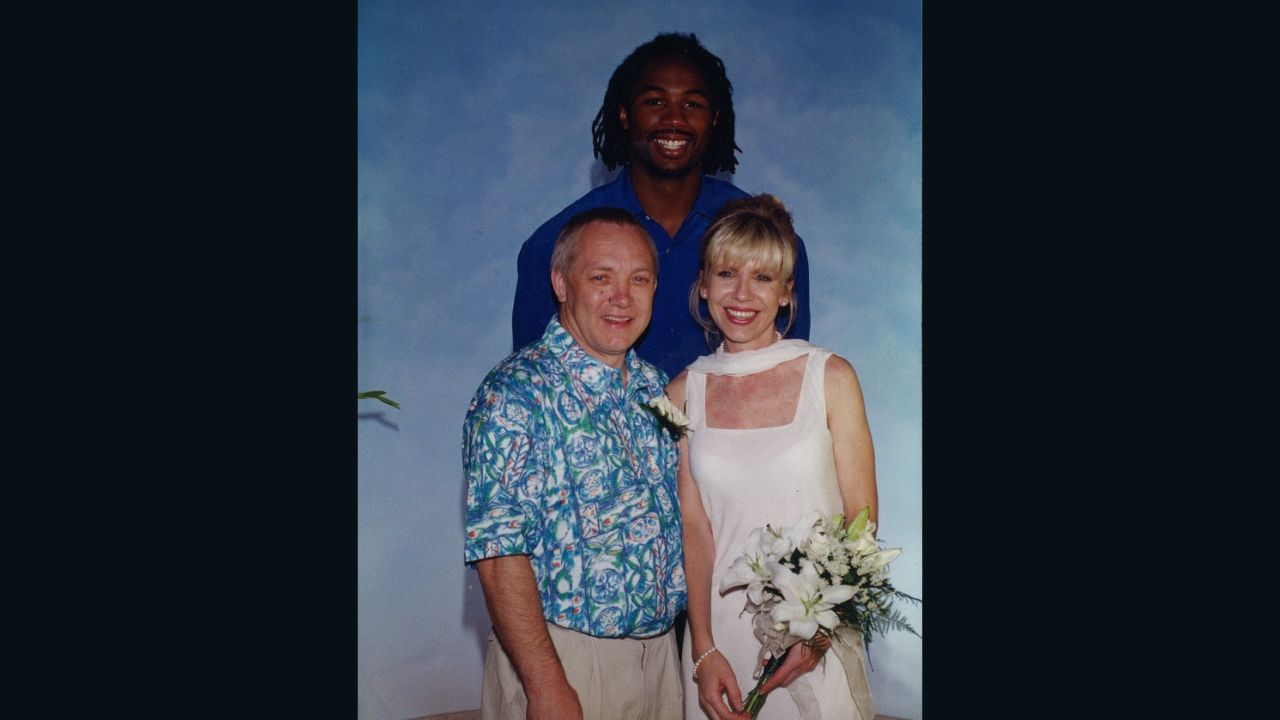 Frank and Tracy Maloney with Lennox Lewis on their wedding day. 
