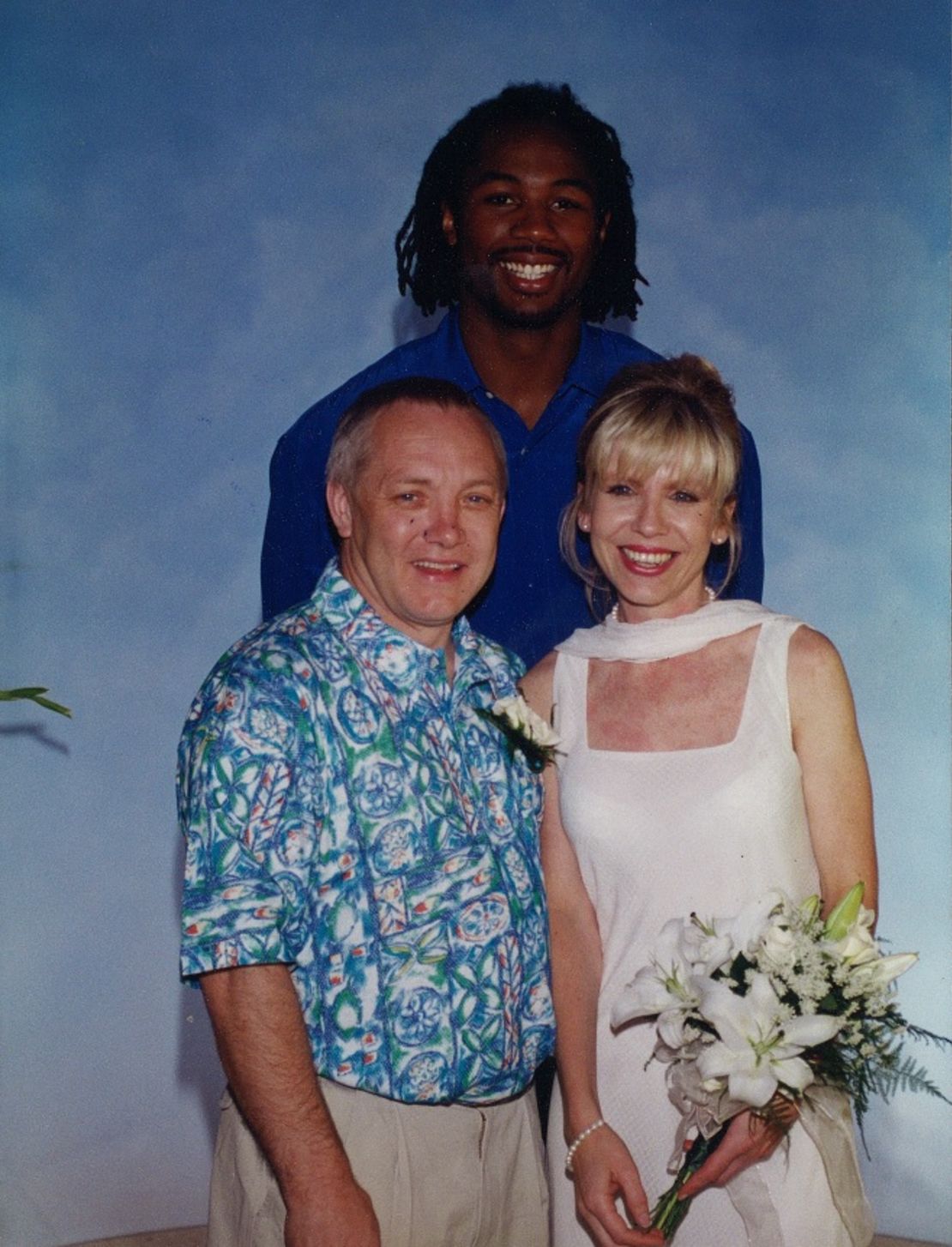 Frank and Tracy Maloney with Lennox Lewis on their wedding day. 