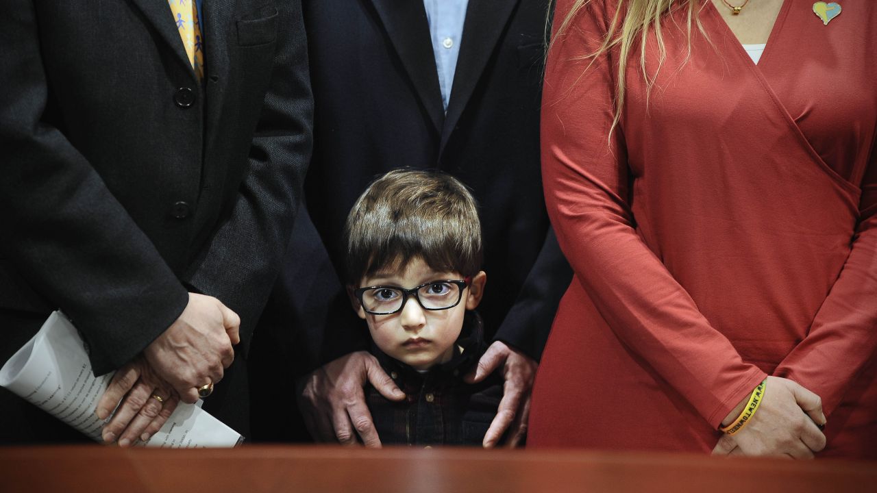 Hayden Lewis, cousin of Sandy Hook shooting victim Jesse Lewis, stands with his family during a news conference in Hartford, Connecticut, on Monday, April 13. Connecticut's congressional delegation backed federal legislation that would provide expanded support to train teachers in social and emotional learning. "If the shooter, in our case, had access to this type of learning before the tragedy at Sandy Hook, it might not have happened," said Jesse's mother, Scarlett. Twenty-six people -- 20 students and six adults -- <a href="http://www.cnn.com/interactive/2012/12/us/sandy-hook-timeline/" target="_blank">were shot and killed</a> by 20-year-old Adam Lanza in December 2012.