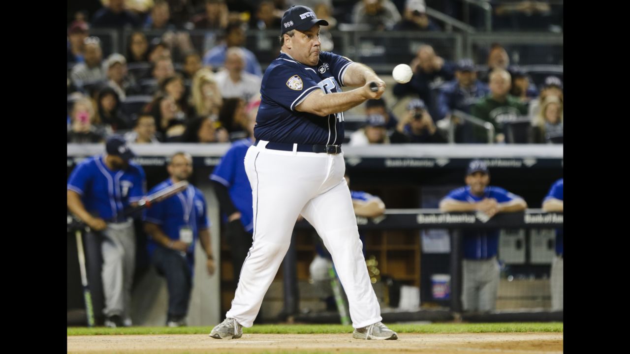 New Jersey Gov. Chris Christie bats during the "True Blue" celebrity softball game Wednesday, June 3, at New York's Yankee Stadium. The charity event raised money to support the families of fallen New York police officers.