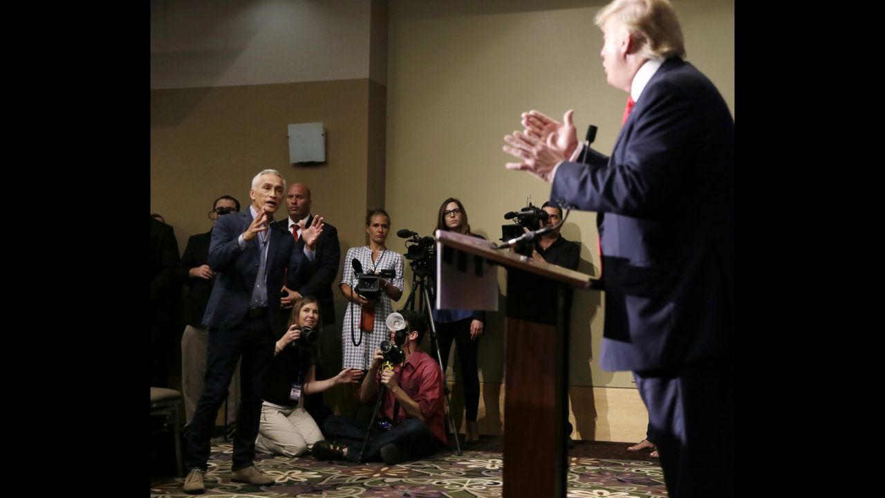 Univision anchor Jorge Ramos, left, asks Republican presidential candidate Donald Trump a question about his immigration plan during a news conference Tuesday, August 25, in Dubuque, Iowa. Ramos <a href="http://www.cnn.com/2015/08/25/politics/donald-trump-megyn-kelly-iowa-rally/index.html" target="_blank">squabbled with Trump twice</a> during the event, and at one point a security officer ejected Ramos before he was allowed back in.