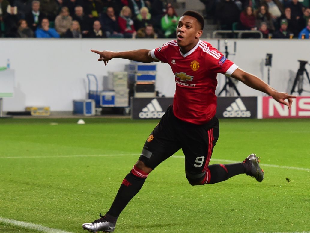 Manchester United's French striker Anthony Martial gave the visitors the lead in a thrilling game.