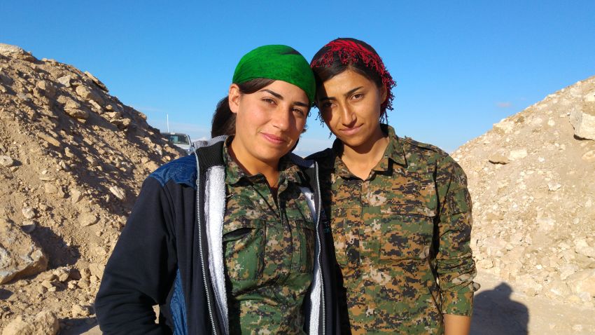Two members of the YPK, the Kurdish "Women's Defence Units," on the front lines south of Al-Houl, in Al-Hassakeh province.