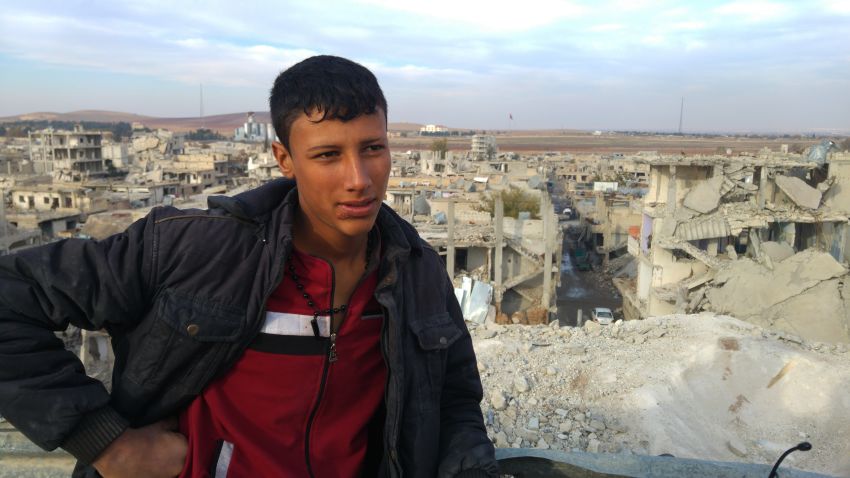 17-year-old Hammouda, a Kobani resident whose hobby is raising pigeons, a pastime banned by ISIS because it's a waste of time. Hammouda fled with his family to Turkey across the border during the five-month battle for Kobani.