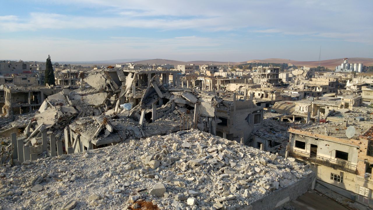 The view from Hammouda's pigeon perch. The reconstruction effort in Kobani has come to a screeching halt after Turkey closed its border, depriving the town of the building materials it desperately needs.