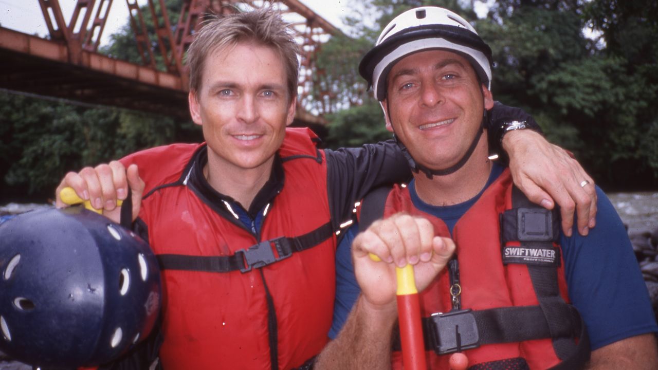Keoghan, left, and a friend strike a pose in Costa Rica, where "The Amazing Race" host marvels at the biodiversity and unique opportunities for rafting and hiking.