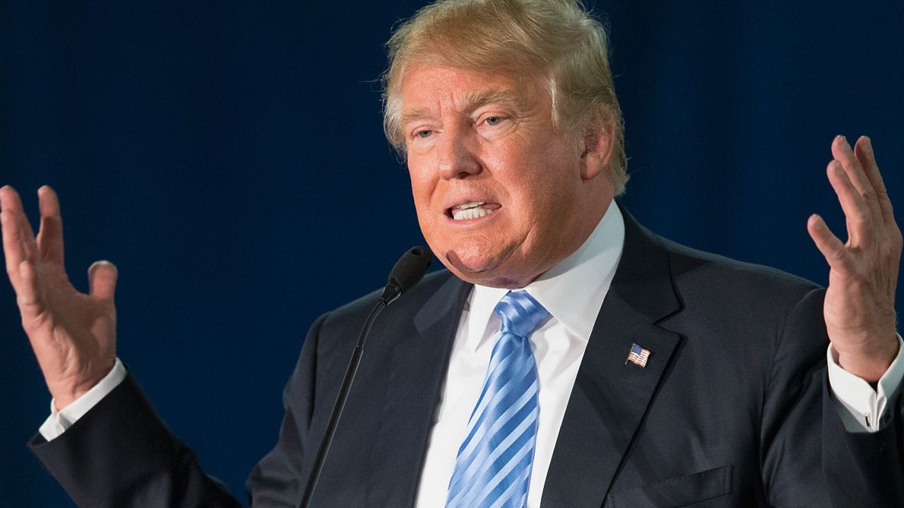 DAVENPORT, IA - DECEMBER 05:  Republican presidential candidate Donald Trump speaks to guests gathered for a campaign event at Mississippi Valley Fairgrounds on December 5, 2015 in Davenport, Iowa. Trump continues to lead the most polls in the race for the Republican nomination for president.  (Photo by Scott Olson/Getty Images)