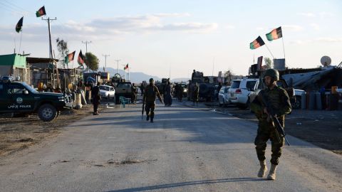 Afghan National Army soldiers stand alert after clashes against security forces at Kandahar Airport on December 9, 2015, a sprawling complex which also houses a joint NATO-Afghan base. At least 37 people were killed when Taliban insurgents wearing military uniforms stormed Kandahar airport, triggering pitched gun battles in a lengthy siege as President Ashraf Ghani on December 9 sought to revive peace talks at a regional conference.The raid on the sprawling complex, which also houses a joint NATO-Afghan base, is seen as the most serious attack on the largest military installation in southern Afghanistan in 14 years of war. AFP PHOTO / Jawed Tanveer
JAWED TANVEER/AFP/Getty Images