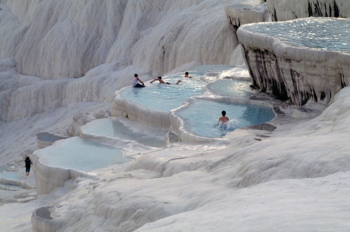 In Turkey, calcite-laden waters have created <a href="http://whc.unesco.org/en/list/485" target="_blank" target="_blank">Pamukkale</a> (Cotton Palace). Terraced basins, petrified waterfalls and mineral forests dot the otherworldly landscape, which is close to the ruins of the Greco-Roman spa town of Hierapolis.