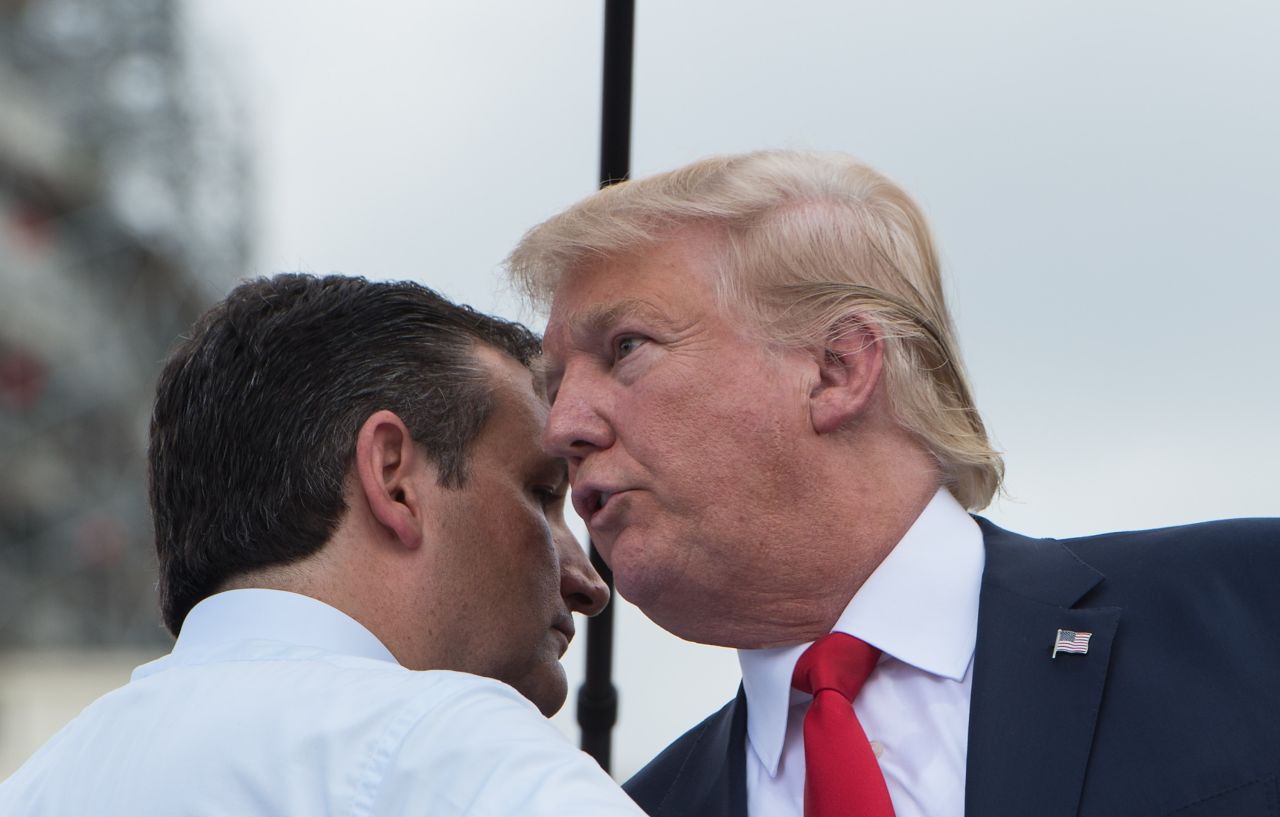 Trump is greeted on stage by U.S. Sen. Ted Cruz, a fellow Republican presidential candidate, before speaking at a Washington rally organized by the Tea Party Patriots on September 9.