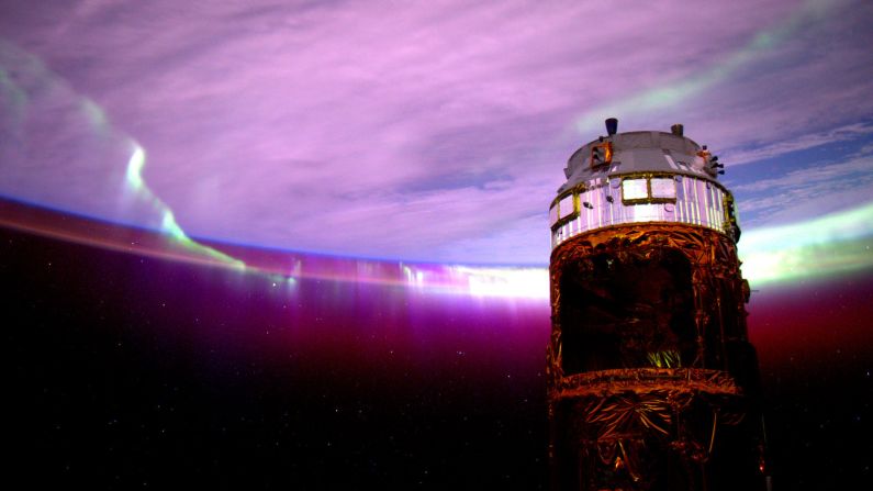 August 27: "Day 154. #Aurora's purple glow adds mystery to the nightscape. Good night from @ISS!"