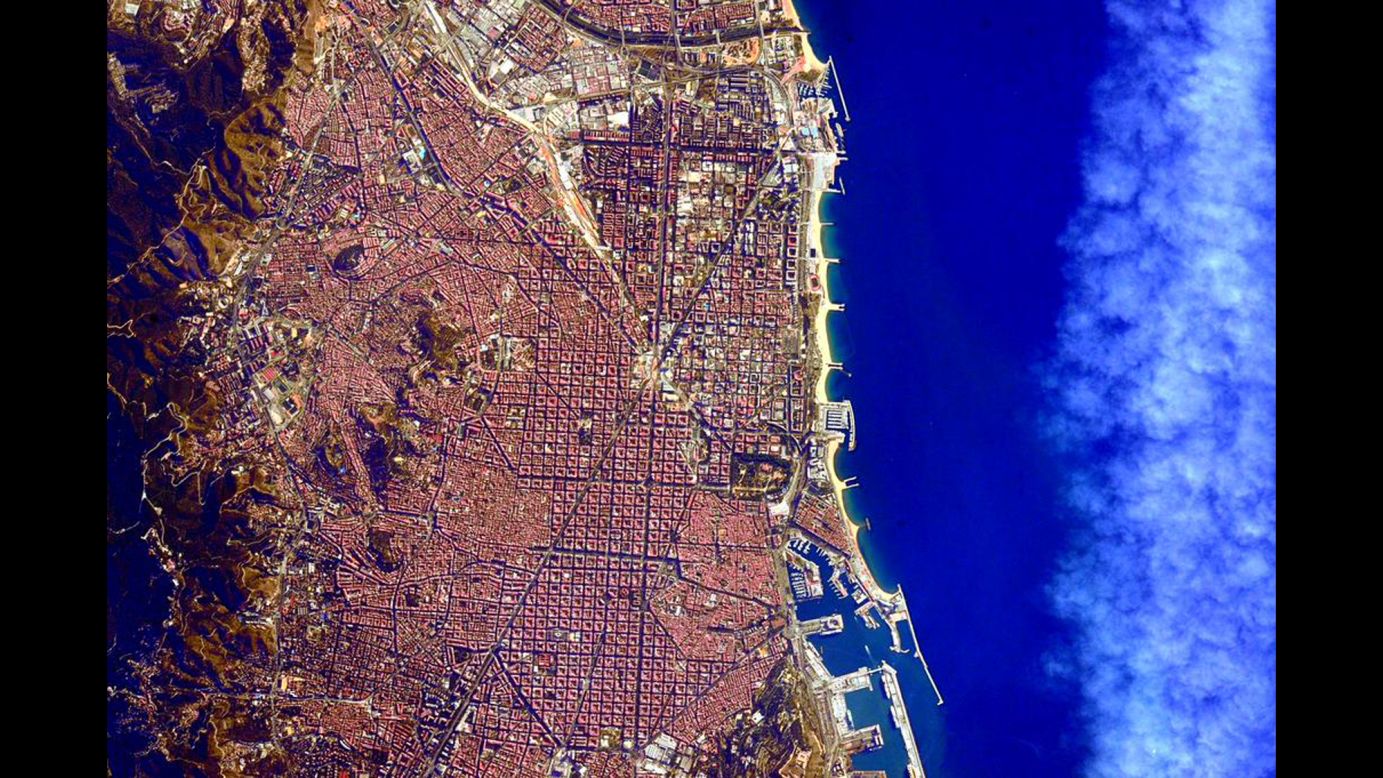 July 28: "#GoodMorning #Barcelona, #Spain! Looking beautiful as usual from @Space_Station. #YearInSpace"