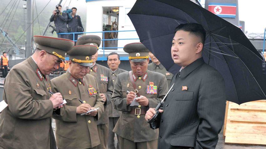 This undated picture released by North Korea's official Korean Central News Agency (KCNA) on May 28, 2013 shows North Korean leader Kim Jong-Un (R, front) inspecting the August 25 Fishery Station under the Korean People's Army (KPA) Unit 313.   AFP PHOTO / KCNA via KNS   
THIS PICTURE WAS MADE AVAIALBLE BY A THIRD PARTY. AFP CAN NOT INDEPENDENTLY VERIFY THE AUTHENTICITY, LOCATION, DATE AND CONTENT OF THIS IMAGE. THIS PHOTO IS DISTRIBUTED EXACTLY AS RECEIVED BY AFP. AFP PHOTO / KCNA via KNS ---EDITORS NOTE--- RESTRICTED TO EDITORIAL USE - MANDATORY CREDIT "AFP PHOTO / KCNA VIA KNS" - NO MARKETING NO ADVERTISING CAMPAIGNS - DISTRIBUTED AS A SERVICE TO CLIENTS ---        (Photo credit should read KCNA/AFP/Getty Images)