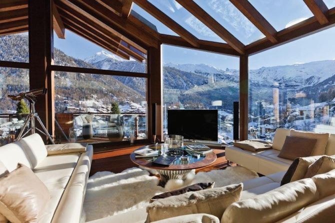 Price: From $55,795/week. Winner of the Best Ski Chalet in Switzerland 2013 at the World Ski Awards, this stunner is reached via a rock tunnel. An elevator takes guests straight to the vast open plan living and dining room, which offers 180-degree views over Zermatt and to the Matterhorn.