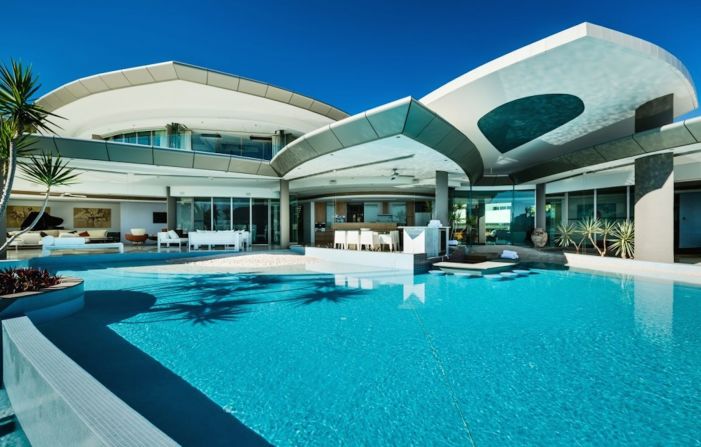 Price: From $13,000 per night. Located in Australia's stunning Whitsundays, AQUA sits on a secluded and private peninsula with its own private beach, marina and helipad. The 40-meter-long infinity edge pool, complete with sandy beach and swim up bar, is one of the largest private pools in Australia. 