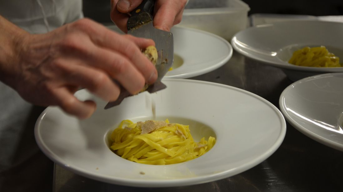 Simplicity is key. Tagliolini is served with a simple base of eggs and truffle butter, topped with shavings of white truffle. "We never cook the white truffle."