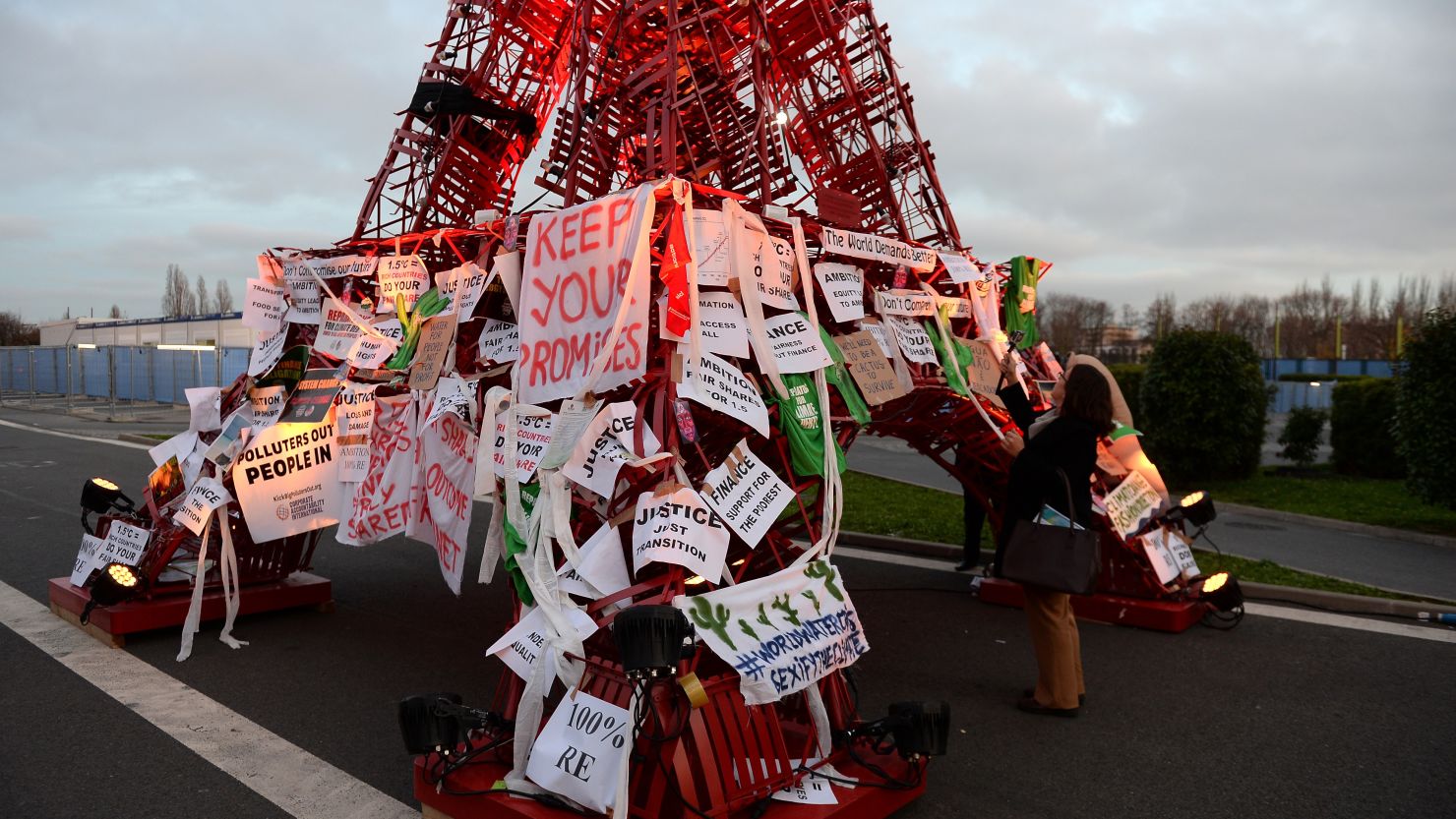 An Eiffel Tower made of bistro chairs is seen covered in messages related to climate change at COP21, the United Nations conference on climate change in Le Bourget, France.