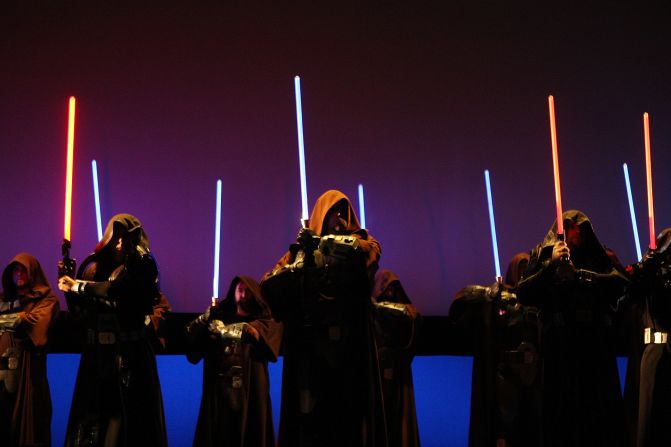 Characters wielding lightsabers take to the stage to promote Star Wars The Old Republic at the Entertainment Software Association (ESA) press conference leading up to opening day of the 2009 E3 Expo on June 1, 2009 in Los Angeles, California. 
